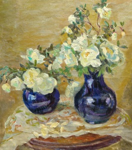 Dogrose in the dark blue vase