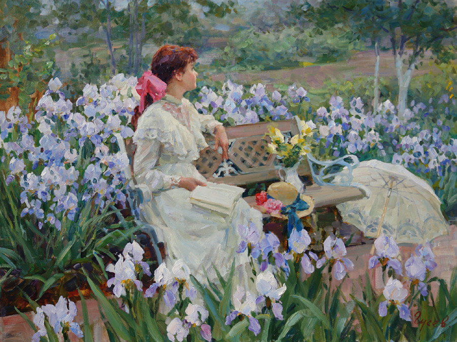 In the garden. Among the irises, Vladimir Gusev- irises. woman relaxing in the garden