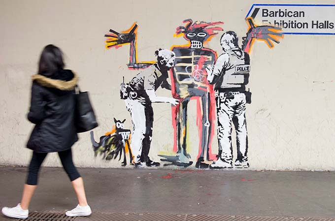 Two new Banksy artworks appear on wall of Barbican centre