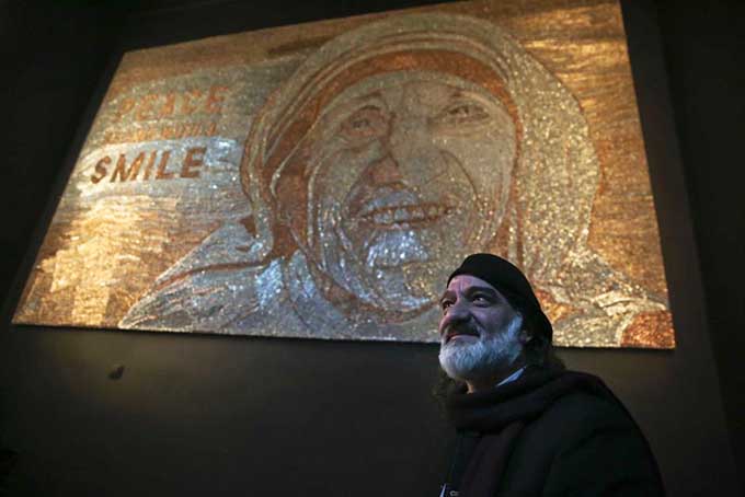 Albanian artist Saimir Strati builds Mother Teresa's mosaic with staples